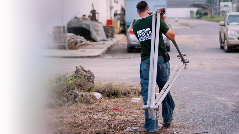 Blaine Whealy helps construct shelter, (c) Kinship Circle